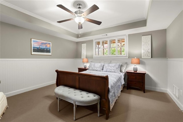 3749 Watkins Pl NE, Brookhaven, GA 30319 - carpeted bedroom featuring wainscoting, ornamental molding, a raised ceiling, ceiling fan, and baseboards