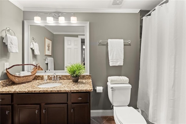 3749 Watkins Pl NE, Brookhaven, GA 30319 - full bathroom with vanity, toilet, baseboards, ornamental molding, and tile patterned floors