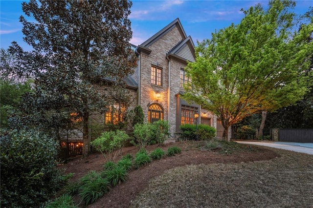 3749 Watkins Pl NE, Brookhaven, GA 30319 - view of front of house with concrete driveway and brick siding