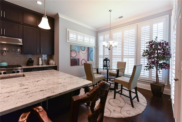 dining space with visible vents, recessed lighting, a chandelier, dark wood-type flooring, and ornamental molding