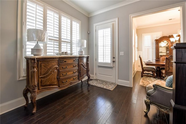 entrance foyer featuring crown molding, baseboards, and dark wood-style flooring