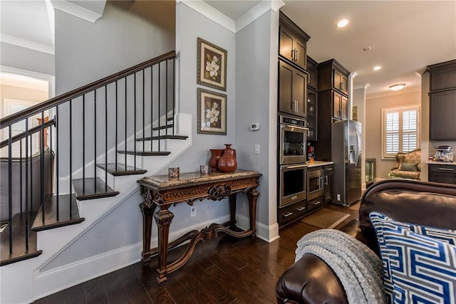 living area featuring crown molding, stairs, baseboards, dark wood-type flooring, and recessed lighting