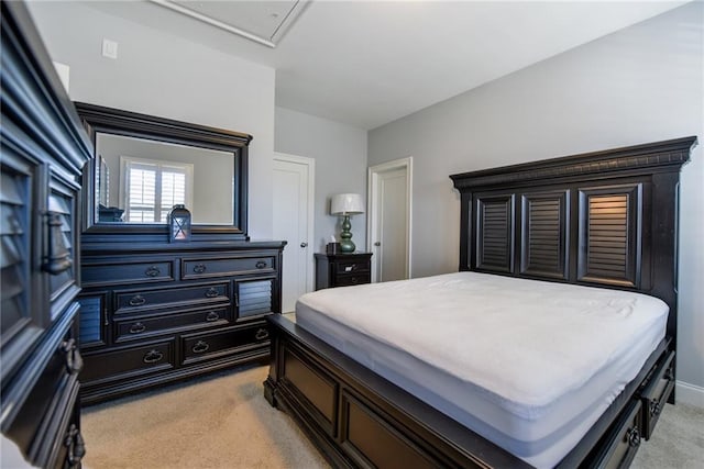 bedroom with light carpet