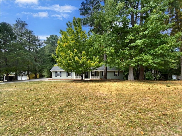 view of front of home with a front lawn and a porch