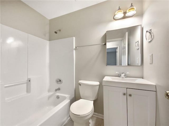 bathroom featuring tub / shower combination, toilet, and vanity