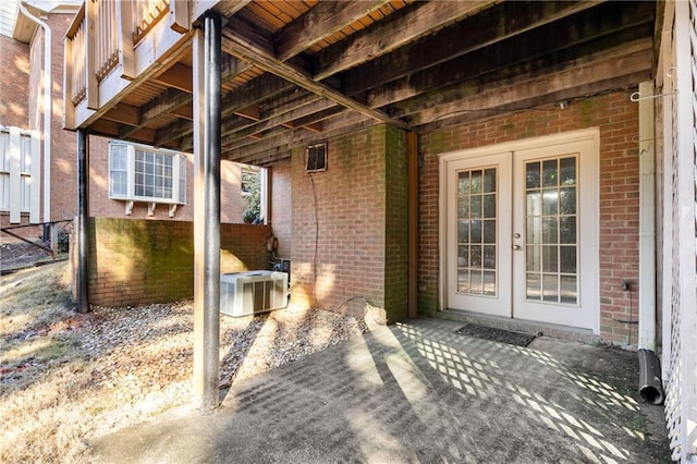 view of patio featuring french doors and cooling unit