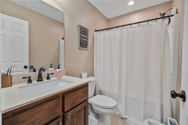 166 Woodford Way SE, Calhoun, GA 30701 - full bathroom featuring toilet, vanity, and tile patterned floors