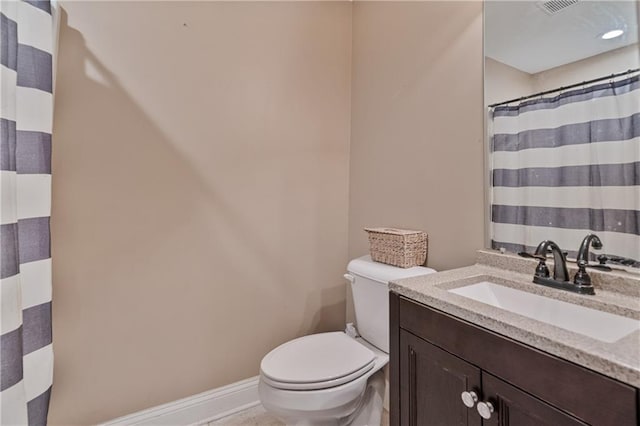 166 Woodford Way SE, Calhoun, GA 30701 - bathroom featuring toilet, vanity, and baseboards