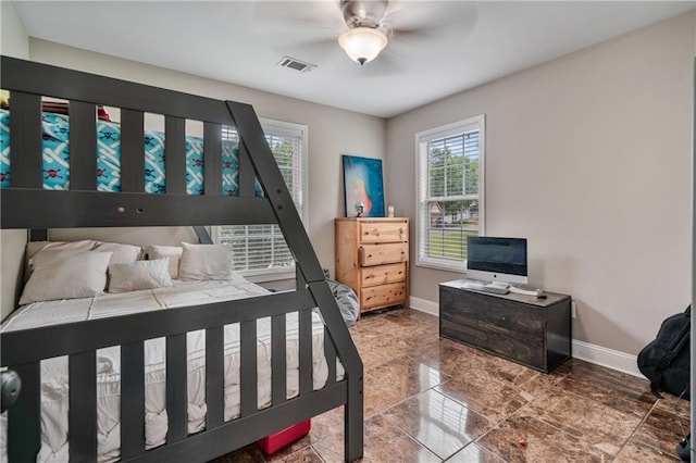 166 Woodford Way SE, Calhoun, GA 30701 - bedroom with baseboards, ceiling fan, and stone finish flooring