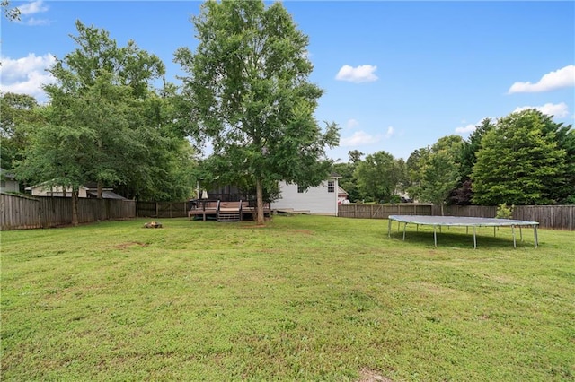 166 Woodford Way SE, Calhoun, GA 30701 - view of yard with a trampoline and a deck