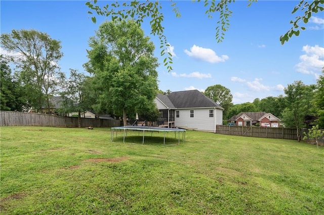 166 Woodford Way SE, Calhoun, GA 30701 - view of yard with a trampoline