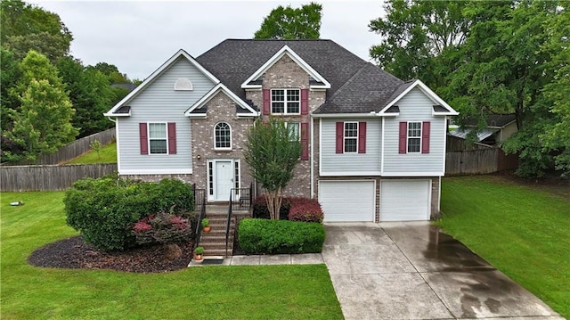 166 Woodford Way SE, Calhoun, GA 30701 - view of front facade featuring brick siding, driveway, an attached garage, and roof with shingles