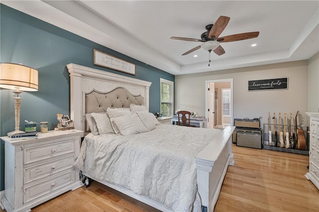 166 Woodford Way SE, Calhoun, GA 30701 - bedroom featuring light wood-type flooring, a raised ceiling, recessed lighting, and ceiling fan