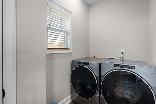 laundry area featuring independent washer and dryer