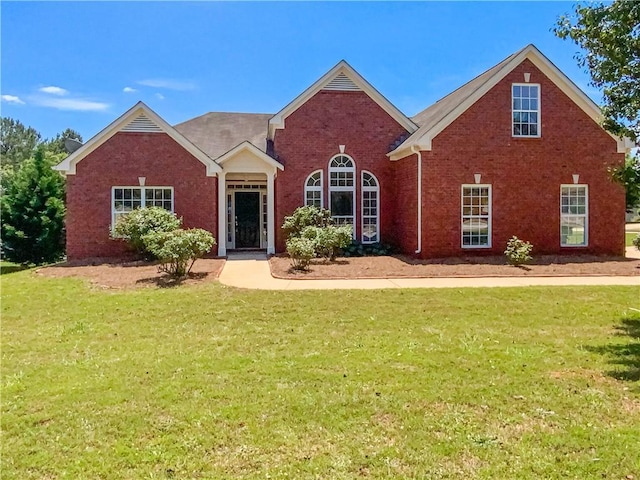 view of front facade with a front yard