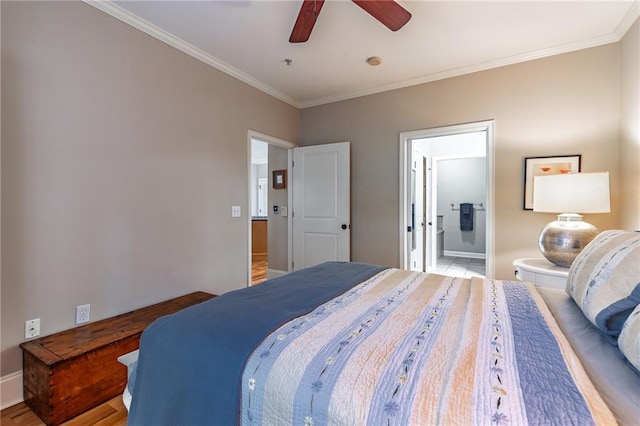 bedroom featuring baseboards, ornamental molding, a ceiling fan, and ensuite bathroom