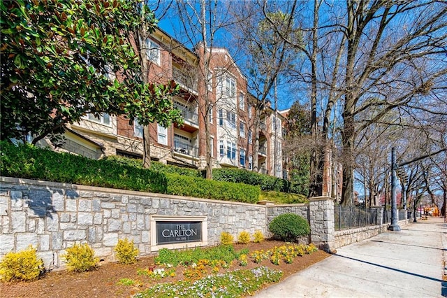 825 Highland Ln Unit 1105, Atlanta, GA 30306 - view of property featuring fence