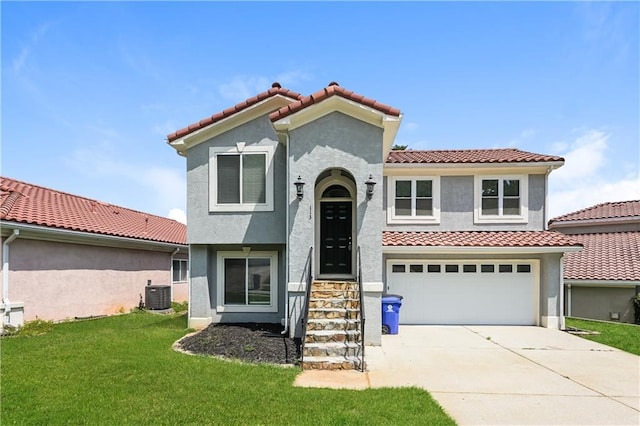 113 Garden Walk, Stockbridge, GA 30281 - mediterranean / spanish home featuring stucco siding, a tile roof, driveway, and a front lawn