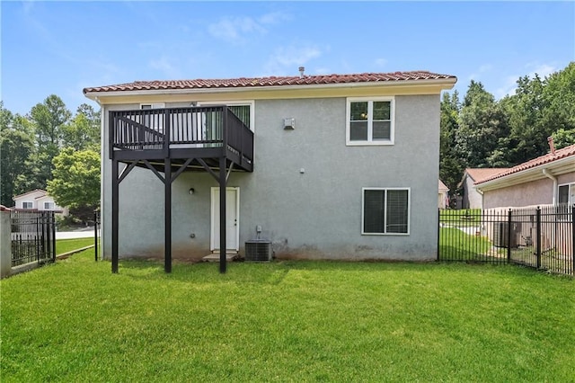 113 Garden Walk, Stockbridge, GA 30281 - back of property featuring stucco siding, a wooden deck, and a tile roof