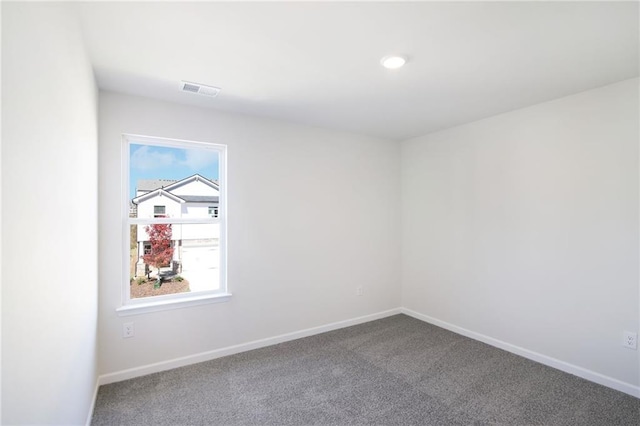 empty room with carpet flooring