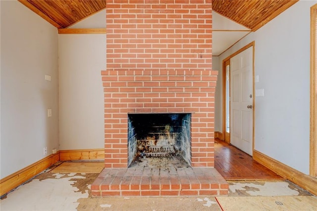 details with a brick fireplace and wood ceiling