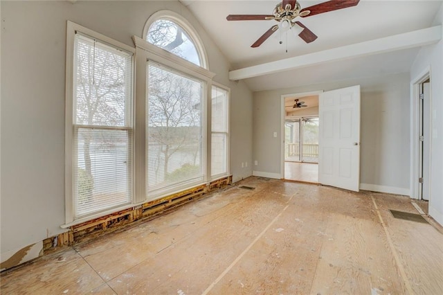 interior space featuring lofted ceiling and ceiling fan