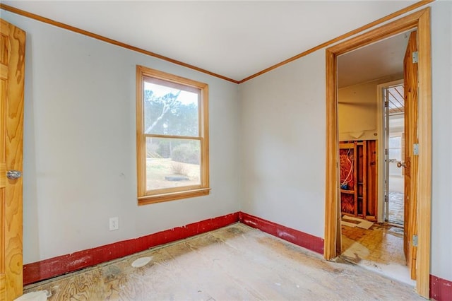 spare room with ornamental molding