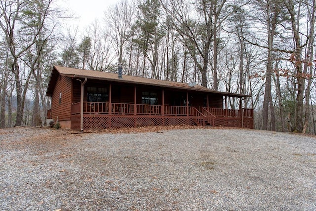 view of front of property featuring covered porch