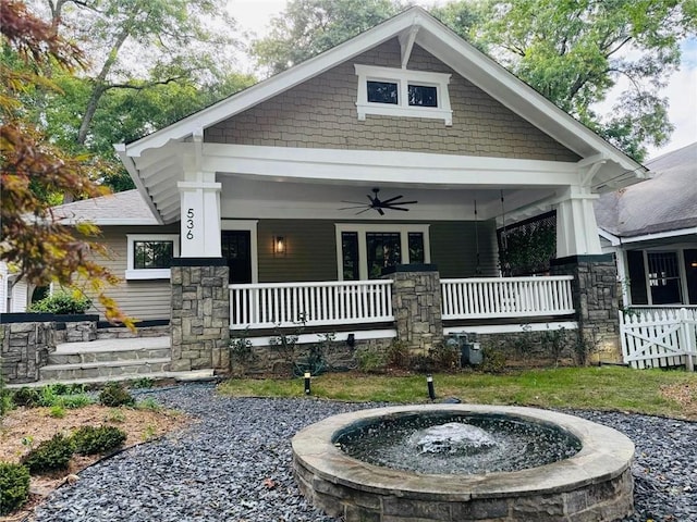 view of front of home with covered porch and ceiling fan