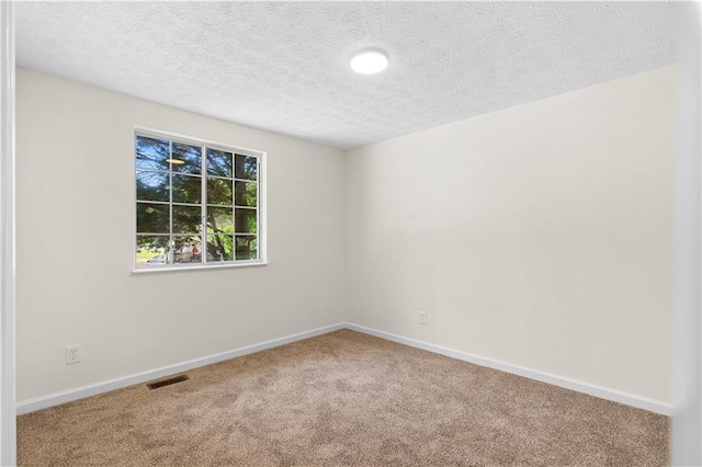 1275 Muirforest Way, Stone Mountain, GA 30088 - unfurnished room with carpet, a textured ceiling, and baseboards