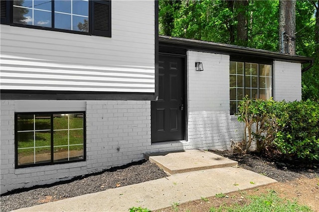 1275 Muirforest Way, Stone Mountain, GA 30088 - view of exterior entry with brick siding