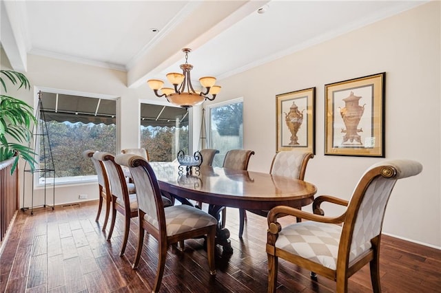 dining area featuring a notable chandelier, ornamental molding, dark wood-style flooring, and a healthy amount of sunlight