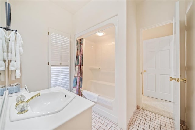 full bath with vanity and tile patterned floors