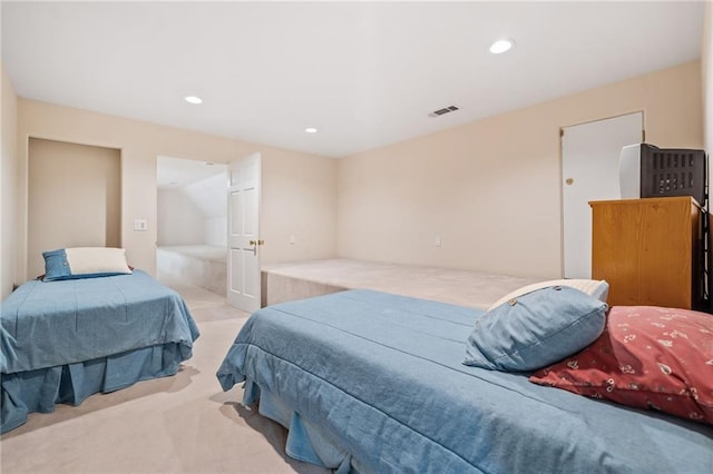 bedroom featuring visible vents, carpet flooring, and recessed lighting