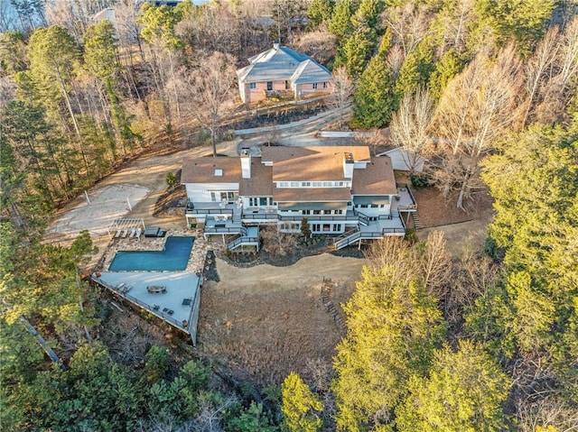 bird's eye view with a forest view