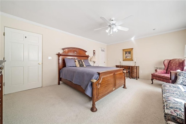 bedroom with ceiling fan, ornamental molding, and light colored carpet