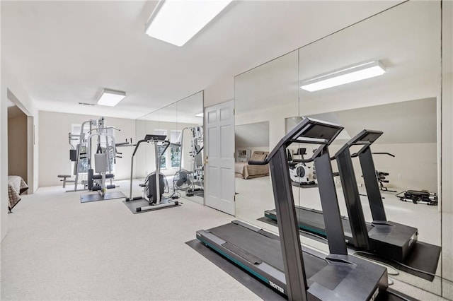 workout area with carpet floors