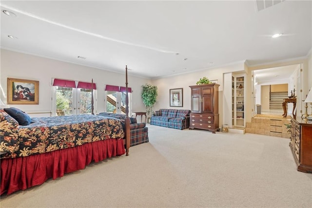 carpeted bedroom featuring access to exterior, french doors, recessed lighting, and crown molding