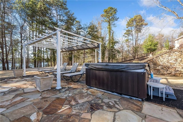 view of patio featuring a pergola and a hot tub