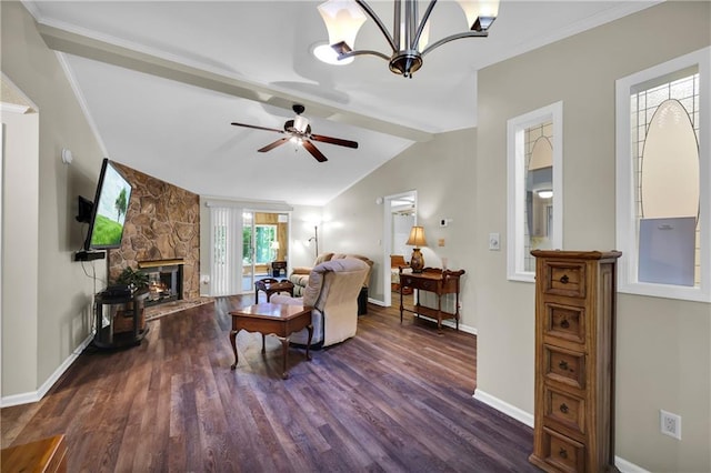 living room with lofted ceiling with beams, a fireplace, dark hardwood / wood-style floors, and ceiling fan with notable chandelier