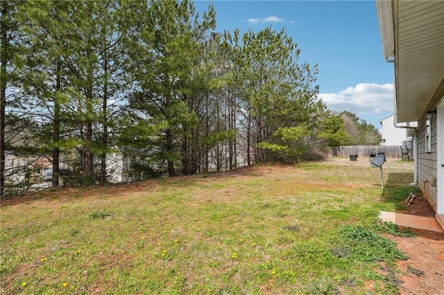 view of yard featuring fence