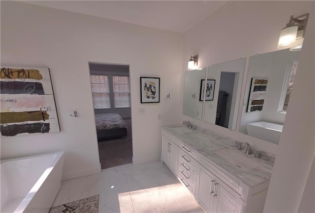 bathroom featuring vanity and a bathing tub