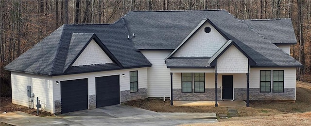 view of front of property with a garage