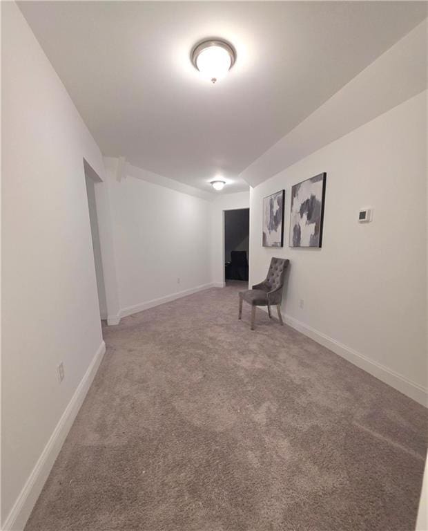 unfurnished room featuring carpet flooring