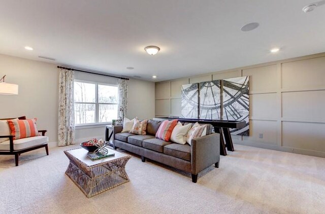 living room featuring light colored carpet