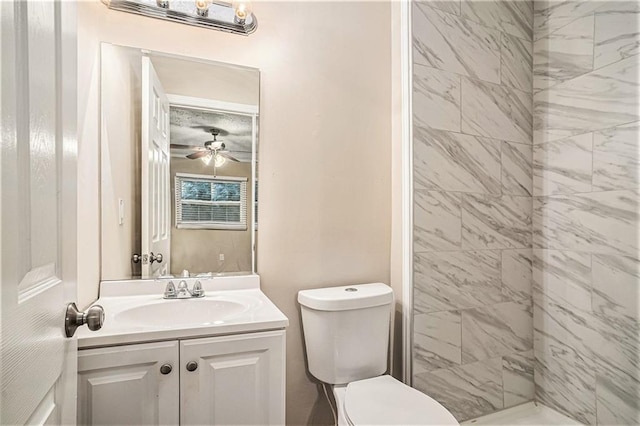 2791 Mcafee Rd, Decatur, GA 30032 - bathroom featuring vanity, ceiling fan, toilet, and tiled shower