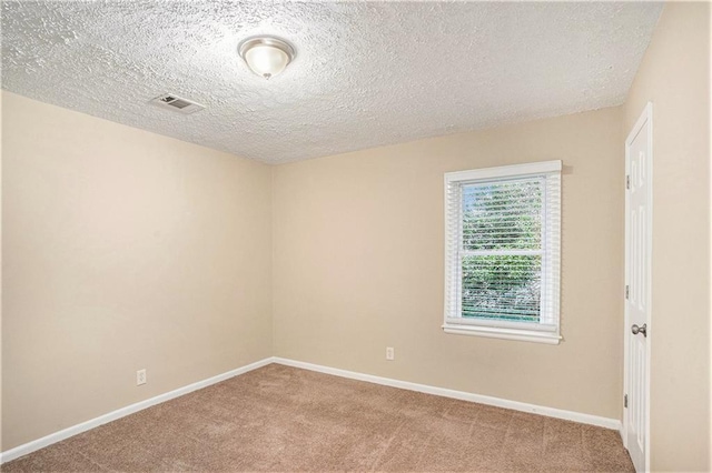 2791 Mcafee Rd, Decatur, GA 30032 - carpeted empty room featuring a textured ceiling