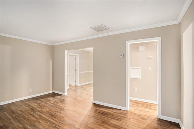 2791 Mcafee Rd, Decatur, GA 30032 - unfurnished room featuring hardwood / wood-style floors and ornamental molding