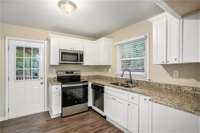 2791 Mcafee Rd, Decatur, GA 30032 - kitchen with white cabinets, sink, and stainless steel appliances