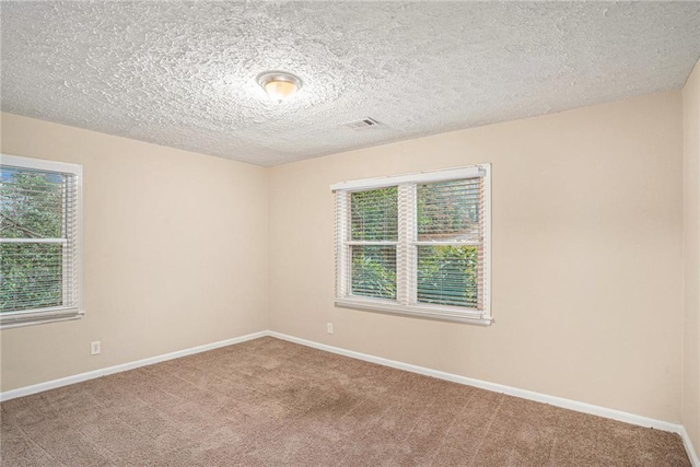 2791 Mcafee Rd, Decatur, GA 30032 - unfurnished room featuring carpet floors and a textured ceiling